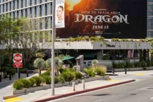 Outdoor View of Madeo Restaurant with Billboard